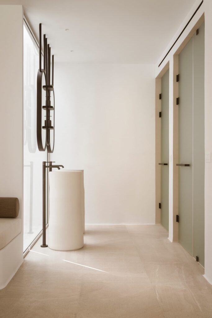 Modern bathroom with minimalist design in a pool suite with side sea view, Cyclades.