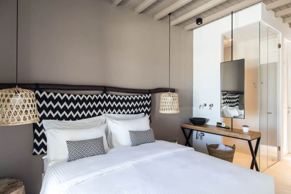 Elegant classic double room with sea and town views at Mr and Mrs White Hotels Cyclades.