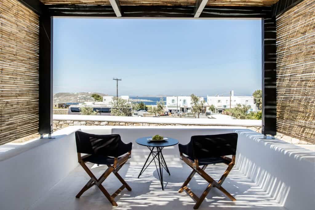 Sea view from a classic double room balcony at Mr and Mrs White Hotels Cyclades.
