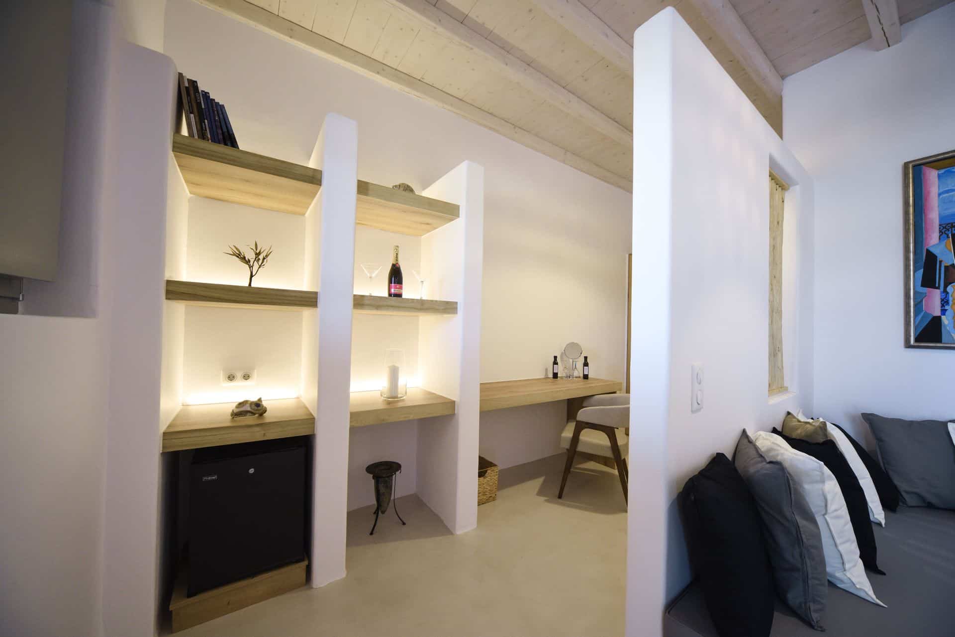 Luxury Cyclades master suite with private plunge pool and modern decor.