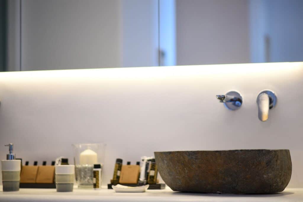 Luxurious executive suite featuring a private plunge pool and modern bathroom amenities.