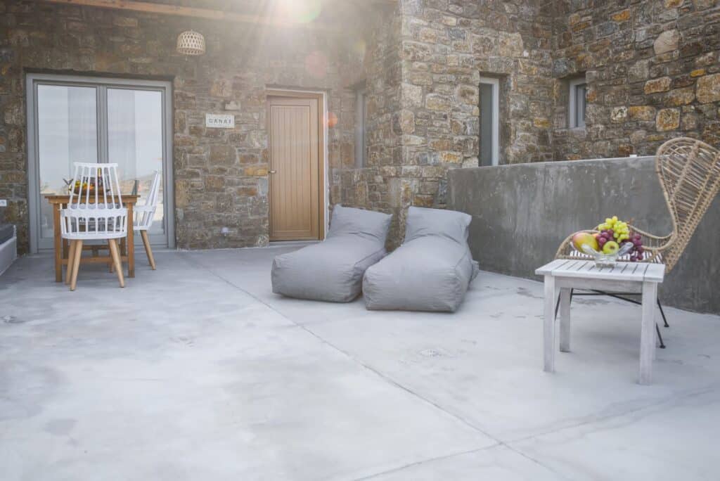 Outdoor seating area of the executive suite with a private plunge pool at Mr and Mrs White Hotels Cy.