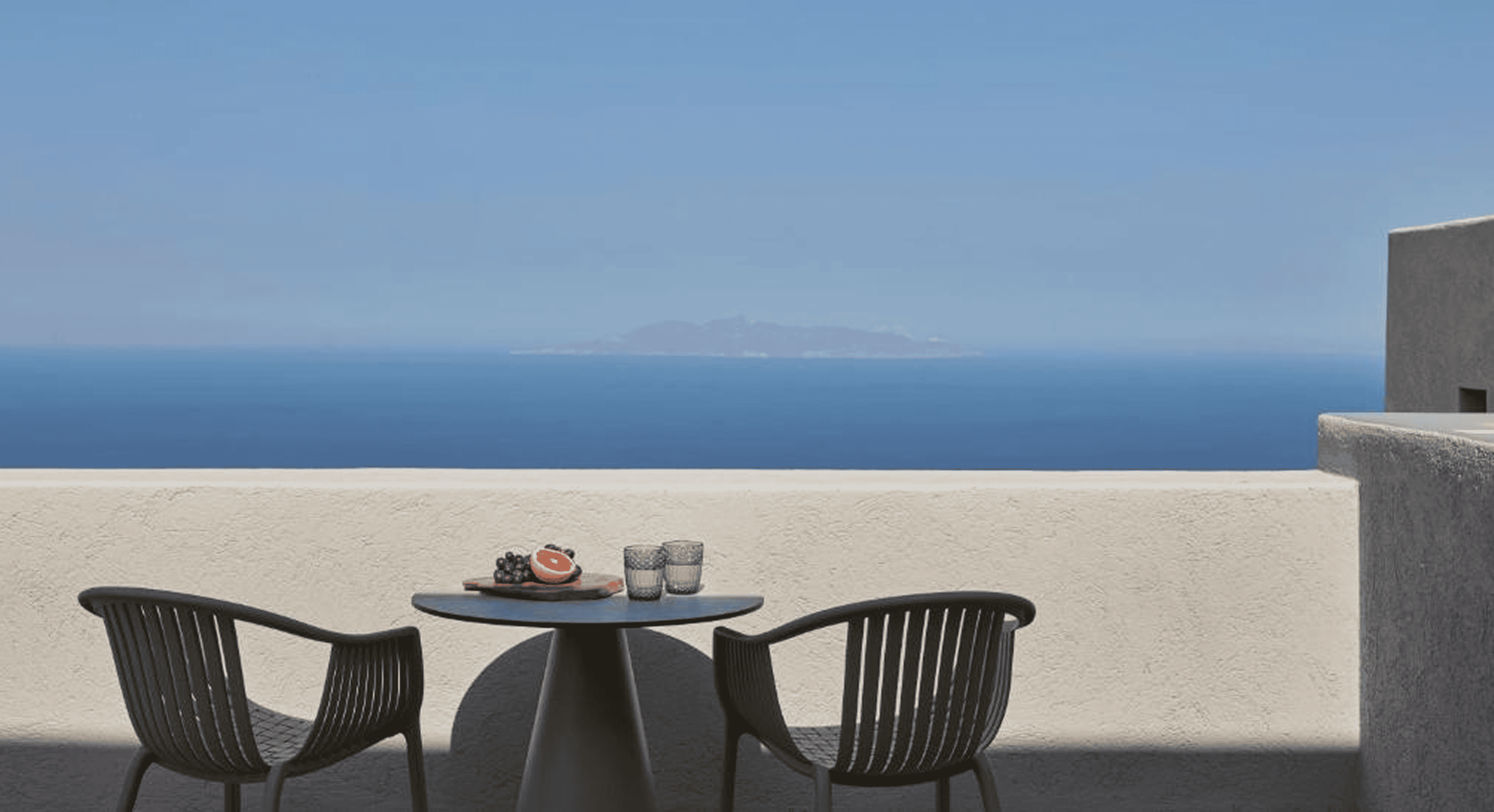 Balcony with sea view at Mr and Mrs White Hotels in the Cyclades, Greece.
