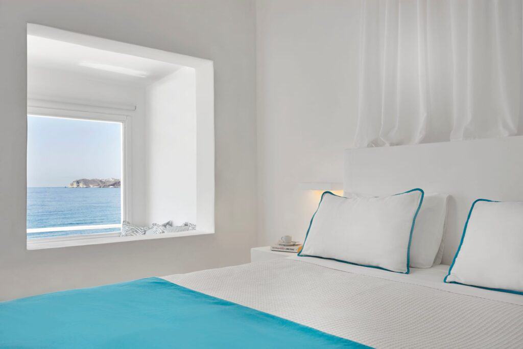 Sea view double room with modern decor and ocean vistas at Mr and Mrs White Hotels Cyclades.