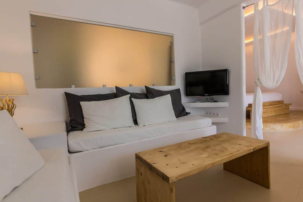 Sea view suite at Mr and Mrs White Hotels Cyclades, Firiplaka Suite with modern decor.