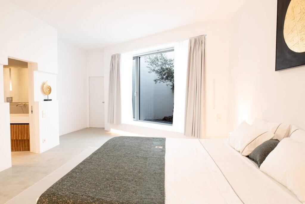 Indoor pool at Heavens Edge Villa, Cyclades, with stunning sea views.