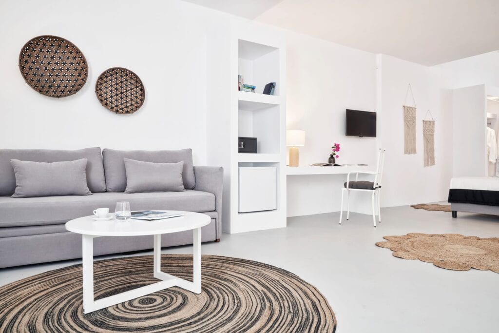 Spacious one-bedroom suite with garden view at Mr and Mrs White Hotels Cyclades, perfect for a relax.