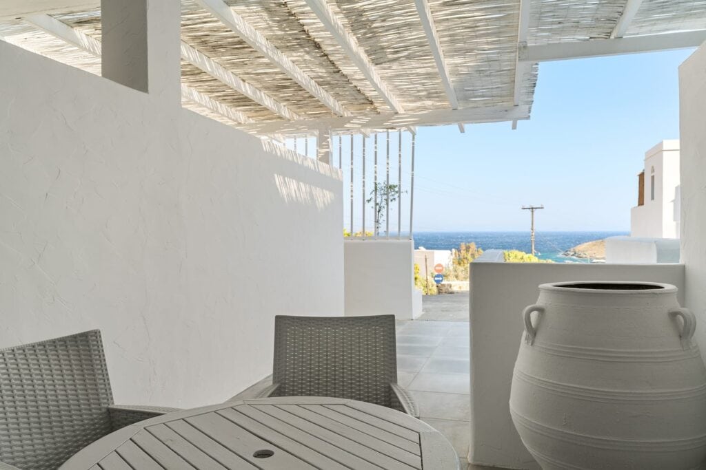 Cozy suite with garden view in Mr and Mrs White Hotels Cyclades, perfect for relaxing stays.
