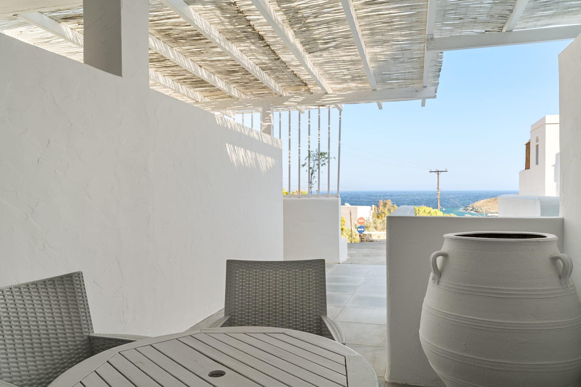 Cozy suite with garden view in Mr and Mrs White Hotels Cyclades, perfect for relaxing stays.