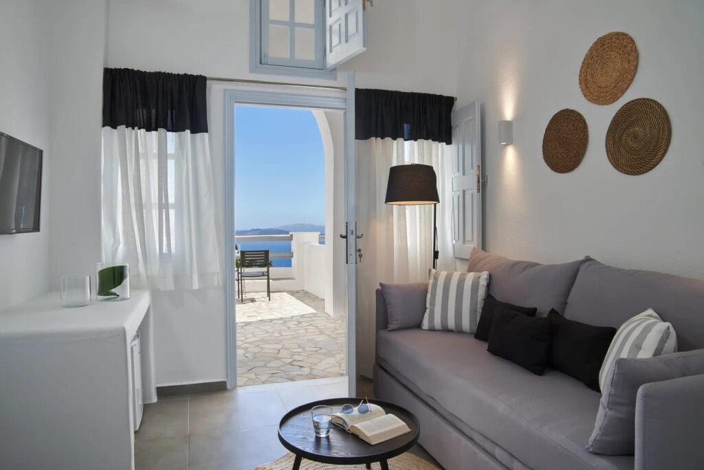 Caldera view from superior room at Mr and Mrs White Hotels Cyclades. Perfect for a relaxing stay in.