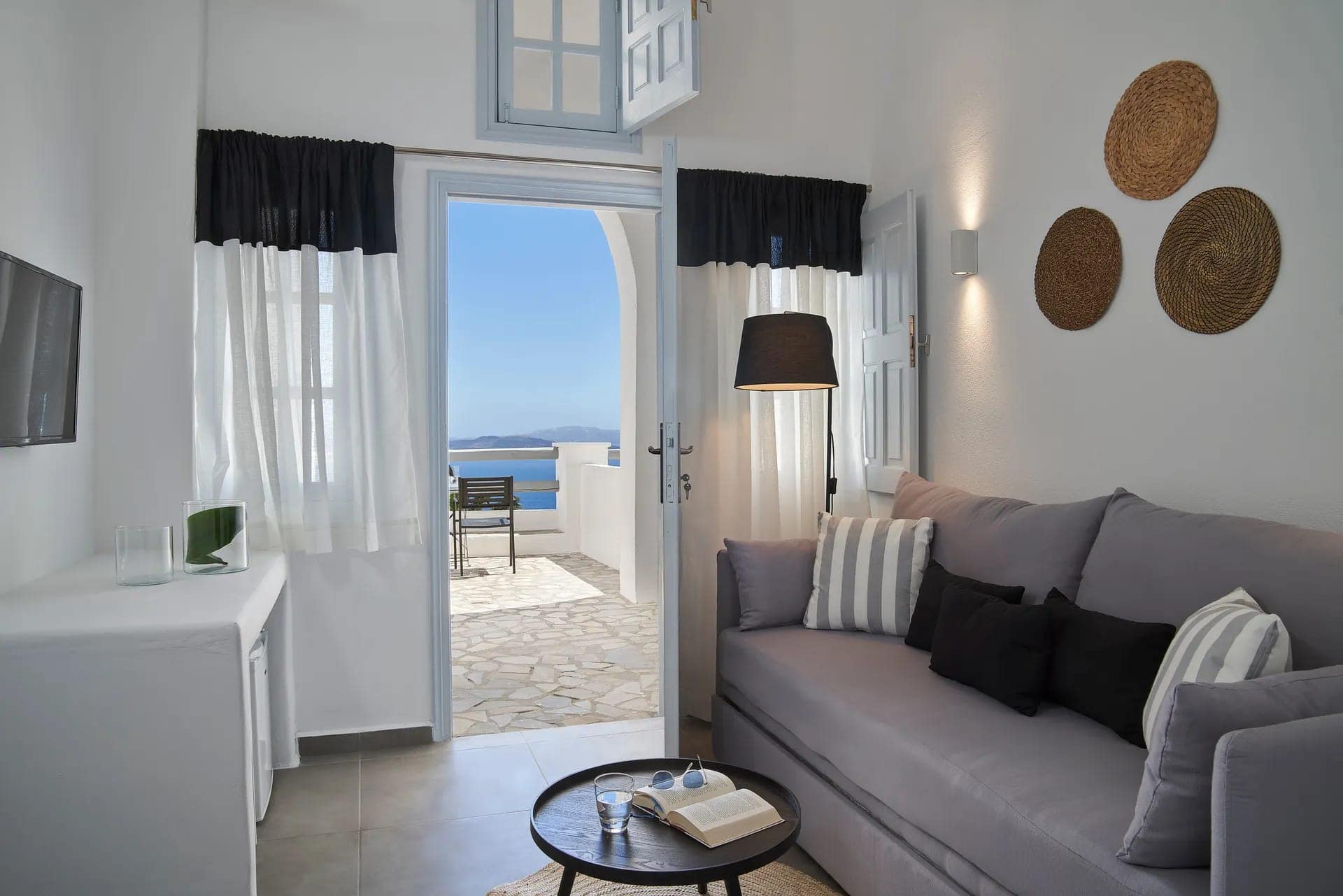 Caldera view from superior room at Mr and Mrs White Hotels Cyclades. Perfect for a relaxing stay in.