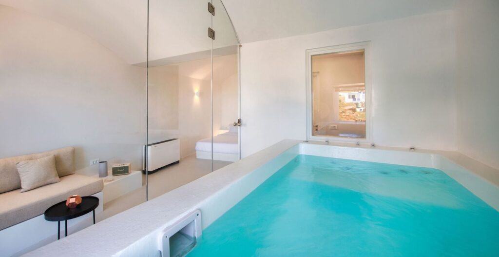 Junior Cave Suite with sea view and jetted tub at Mr and Mrs White Hotels Cyclades.