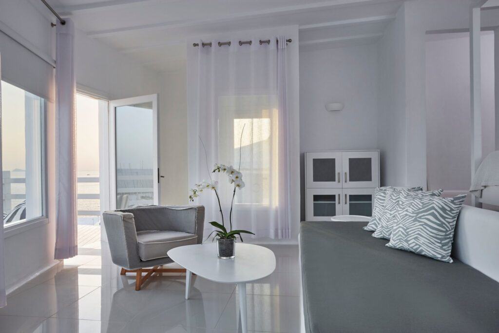 Sea view Notos Suite with stylish decor and bright natural light.