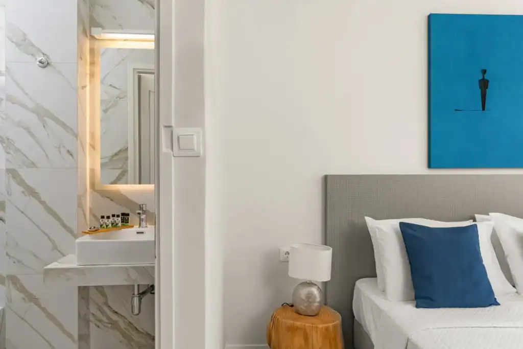Luxurious suite featuring contemporary design, comfortable bedding, and stylish accents in the Cycla.
