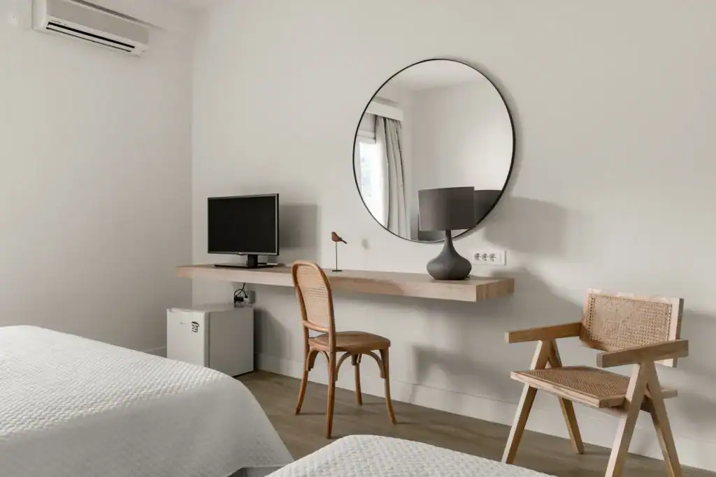 Sea view superior triple room at Mr and Mrs White Hotels Cyclades, modern decor and relaxing ambianc.