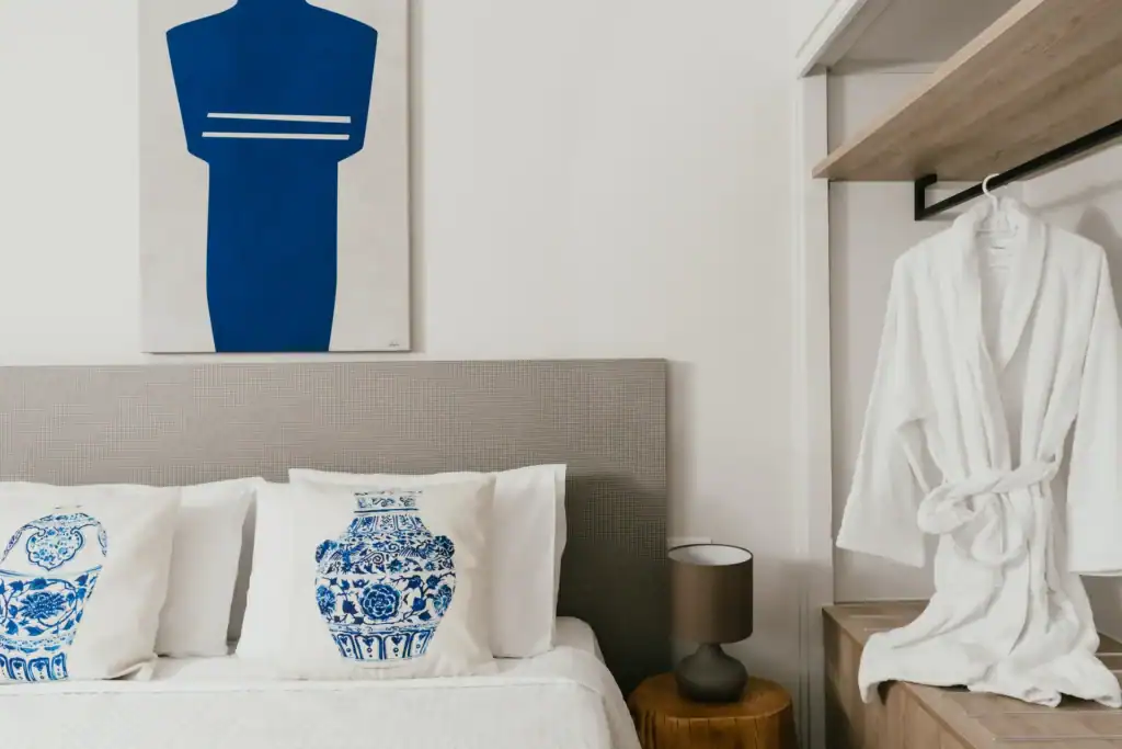 Sea View Suite with Modern Decor and Comfortable Bed.