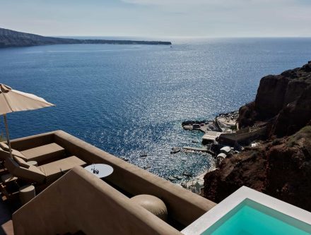 Sea view from Cyclades master suite with heated pool and outdoor lounge area. Perfect for relaxing a.