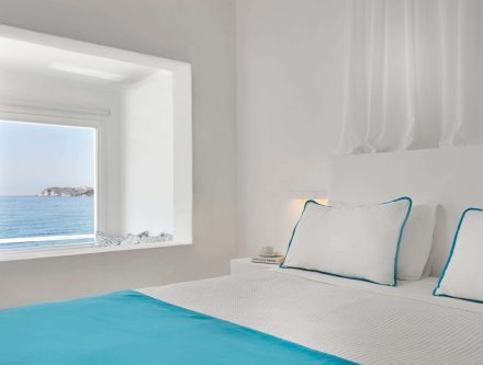 Sea view double room with modern decor and ocean vistas at Mr and Mrs White Hotels Cyclades.