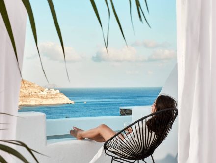 Sea view junior suite with balcony overlooking the Aegean Sea, perfect for a relaxing stay in the Cy.