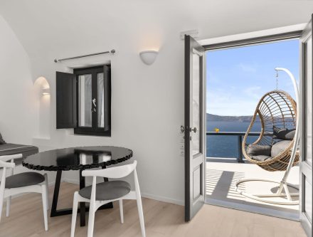 Elegant suite with outdoor jetted tub overlooking the caldera in Santorini. Perfect for a romantic g.