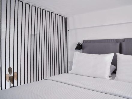 Sea view superior accessible room with modern decor and comfortable bedding at Mr and Mrs White Hote.