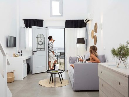 Elegant room with caldera view in Mr and Mrs White Hotels Cyclades. Perfect for a relaxing stay in S.
