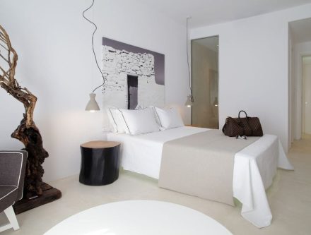 Elegant deluxe room with garden view at Mr and Mrs White Hotels Cyclades.