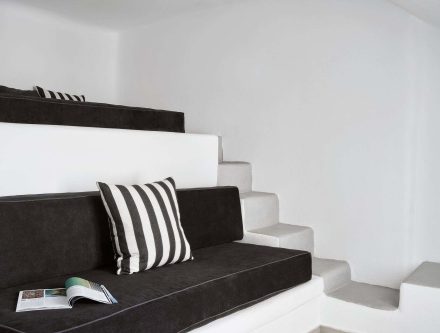 Modern two-bedroom family suite with black and white decor in Cyclades.